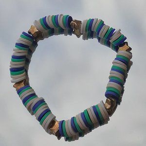 Play bead stretchy string bracelet When you buy 2 you get 1 free bracelet!